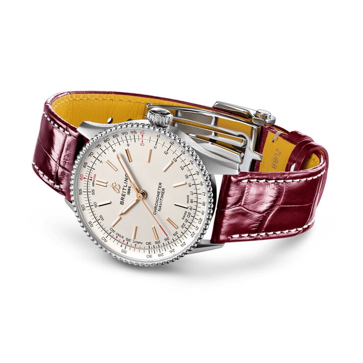 Breitling horloge met een kast in staal, met een wijzerplaat in het beige en een diameter van 36 mm