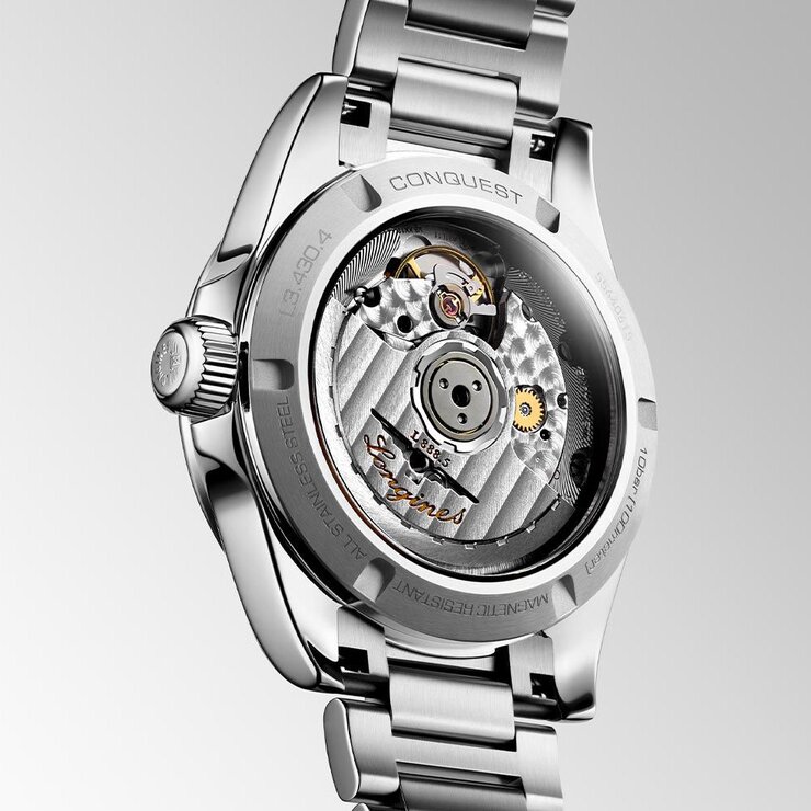 Longines horloge met een kast in staal, met een wijzerplaat in het bruin en een diameter van 34 mm