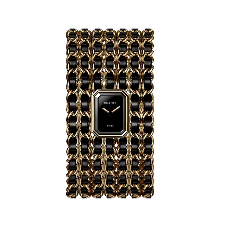 CHANEL horloge met een kast in staal met coating van geel goud (0,1 micron), met een wijzerplaat in het zwart en een diameter van 19,7 x 15,2