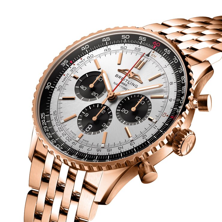 Breitling horloge met een kast in rosé goud, met een wijzerplaat in het zilver en een diameter van 46