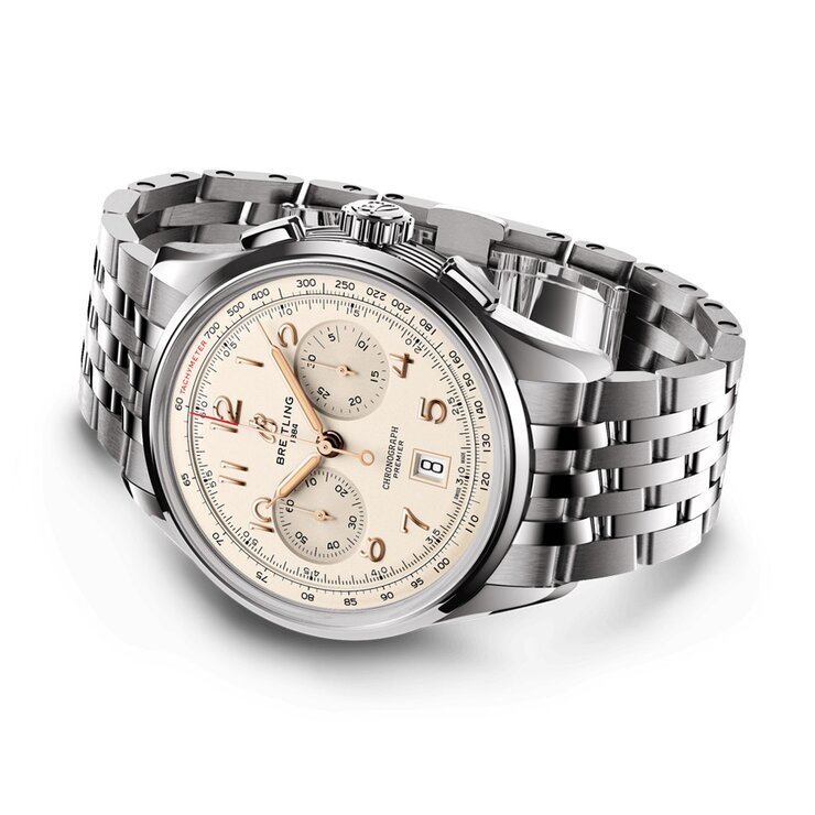 montre Breitling avec un boîtier en acier, un cadran beige et un diamètre de 42