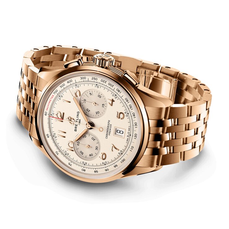 Breitling horloge met een kast in rosé goud, met een wijzerplaat in het beige en een diameter van 42