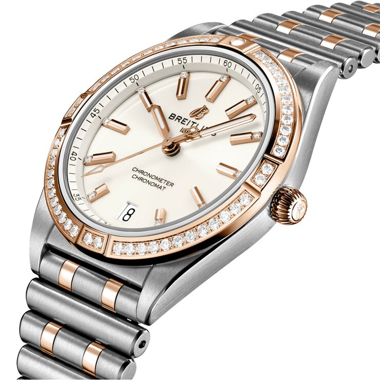 Breitling horloge met een kast in rosé goud op staal, met een wijzerplaat in het zilver met briljant en een diameter van 36 mm