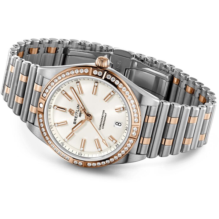 Breitling horloge met een kast in rosé goud op staal, met een wijzerplaat in het zilver met briljant en een diameter van 36 mm