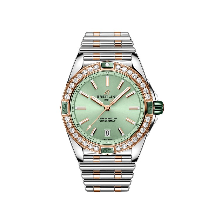 montre Breitling avec un boîtier en or rose sur acier, un cadran vert et un diamètre de 38