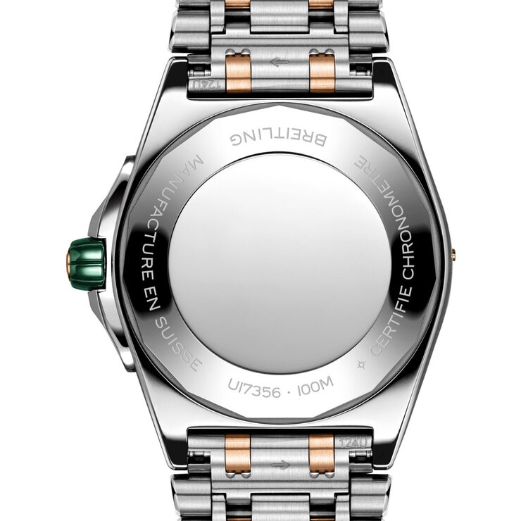 montre Breitling avec un boîtier en or rose sur acier, un cadran vert et un diamètre de 38