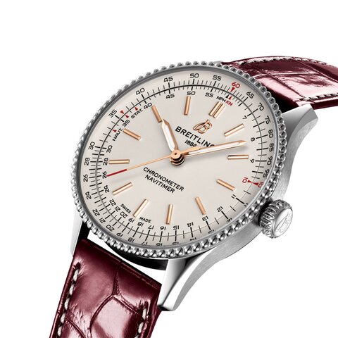 Breitling horloge met een kast in staal, met een wijzerplaat in het beige en een diameter van 36 mm