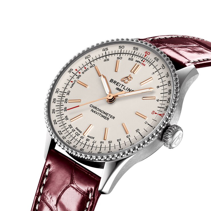 Breitling horloge met een kast in staal, met een wijzerplaat in het beige en een diameter van 36