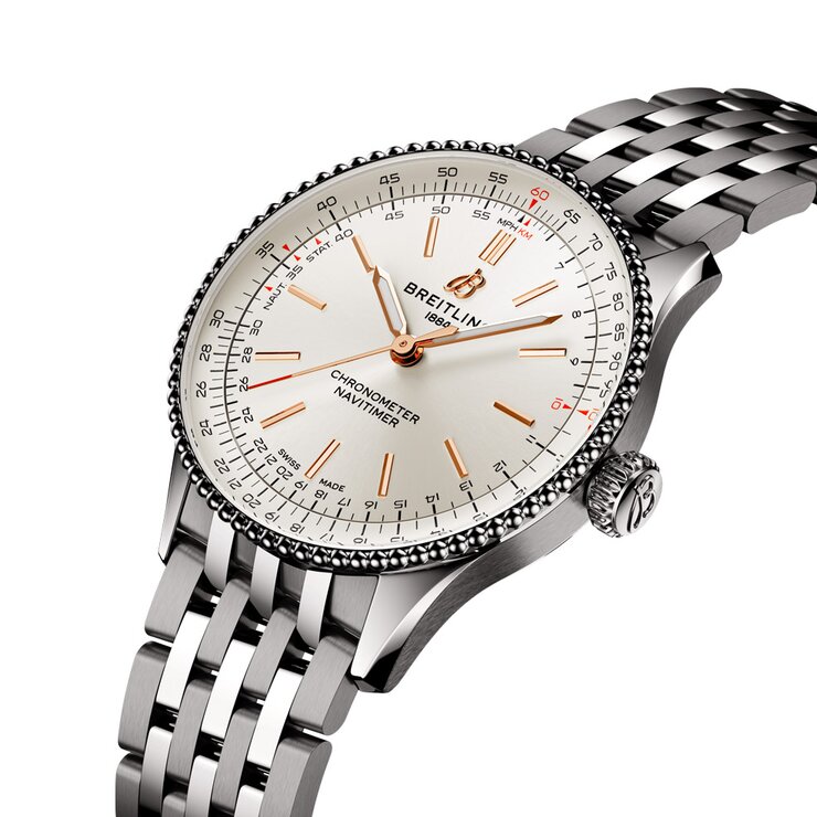 Breitling horloge met een kast in staal, met een wijzerplaat in het beige en een diameter van 36