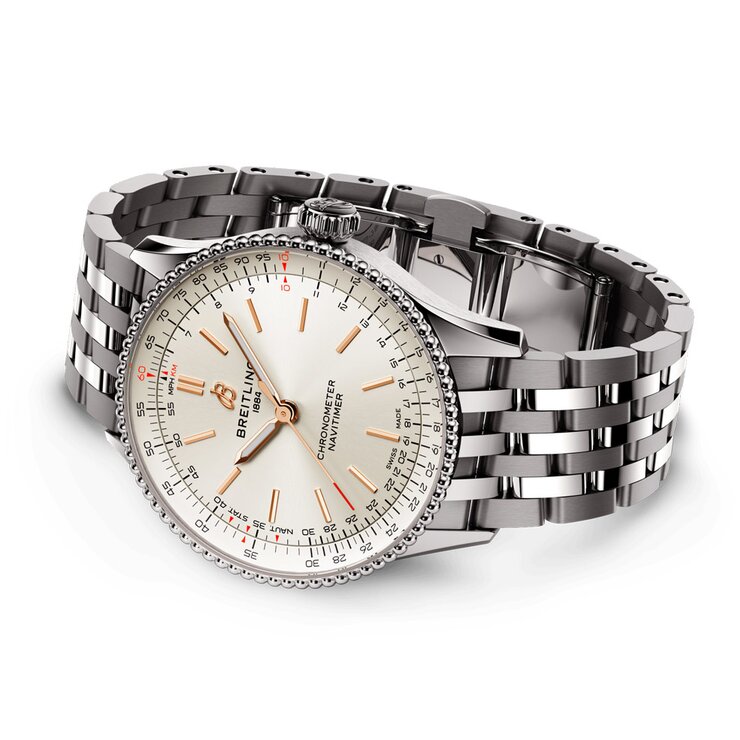 Breitling horloge met een kast in staal, met een wijzerplaat in het beige en een diameter van 36