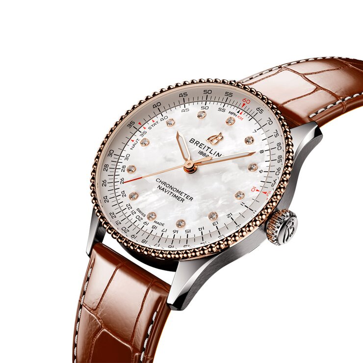 Breitling horloge met een kast in staal, met een wijzerplaat in het parelmoer met  briljant en een diameter van 36 mm