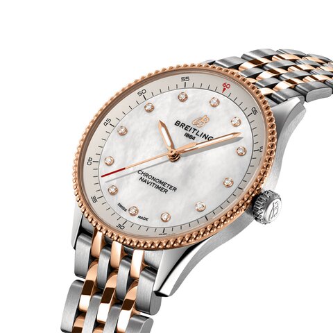 Breitling horloge met een kast in staal, met een wijzerplaat in het parelmoer met  briljant en een diameter van 32 mm