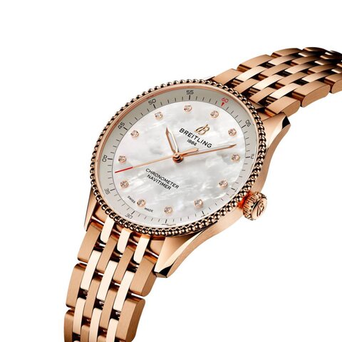 Breitling horloge met een kast in rosé goud, met een wijzerplaat in het parelmoer met  briljant en een diameter van 32 mm