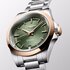 montre Longines avec un boîtier en or rose sur acier, un cadran vert et un diamètre de 34 - thumb