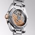 montre Longines avec un boîtier en or rose sur acier, un cadran vert et un diamètre de 34 - thumb
