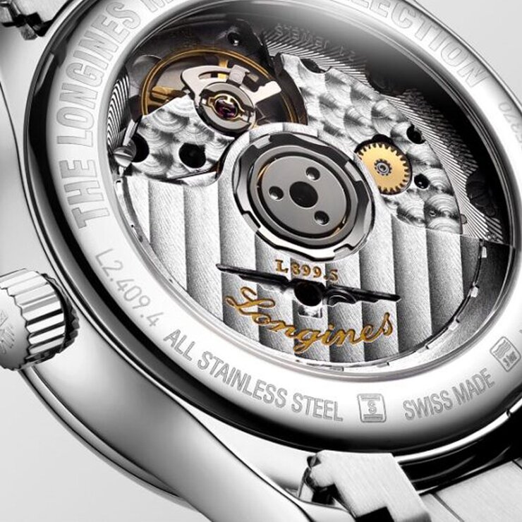 montre Longines avec un boîtier en acier, un cadran bleu avec diamant et un diamètre de 34
