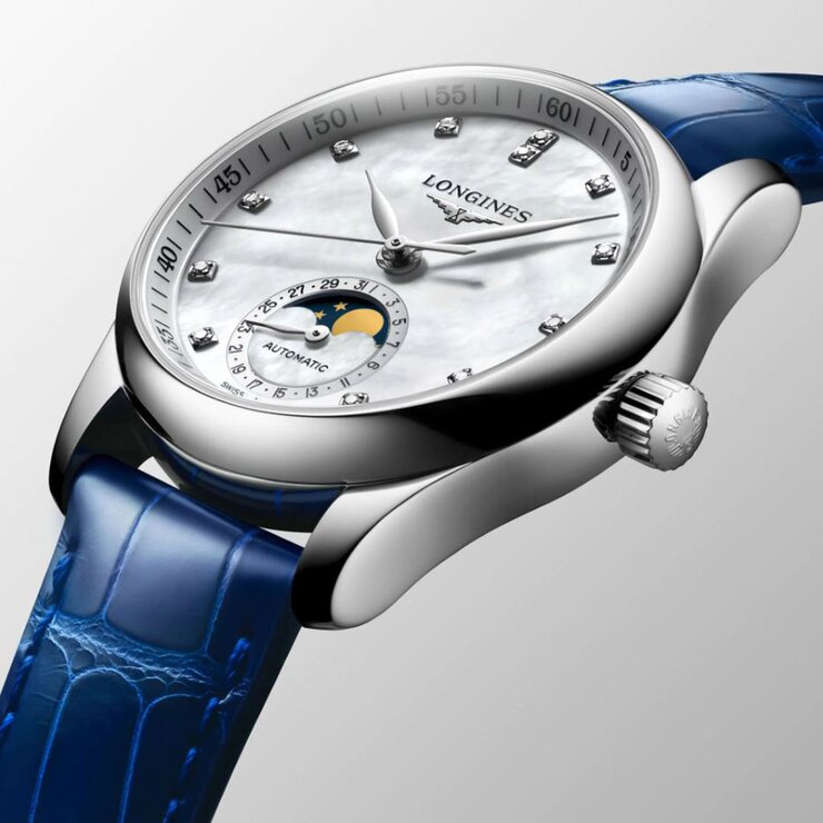 montre Longines avec un boîtier en acier, un cadran nacre avec brillant et un diamètre de 34