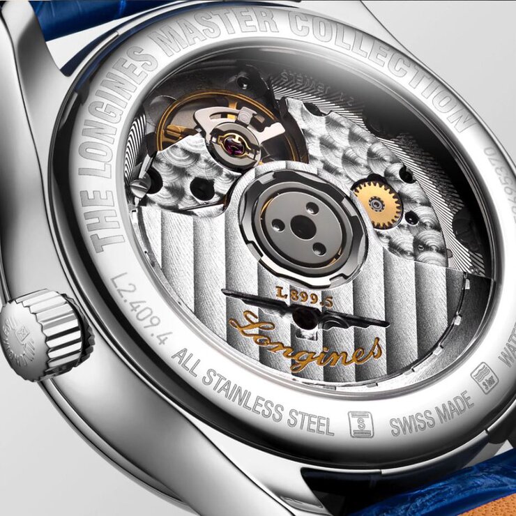 montre Longines avec un boîtier en acier, un cadran nacre avec brillant et un diamètre de 34