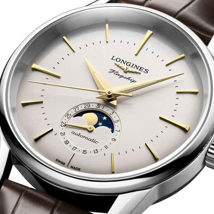 Longines horloge met een kast in staal, met een wijzerplaat in het beige en een diameter van 38.5 mm