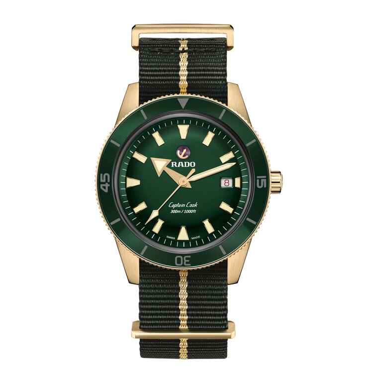 Rado horloge met een kast in brons, met een wijzerplaat in het groen en een diameter van 42
