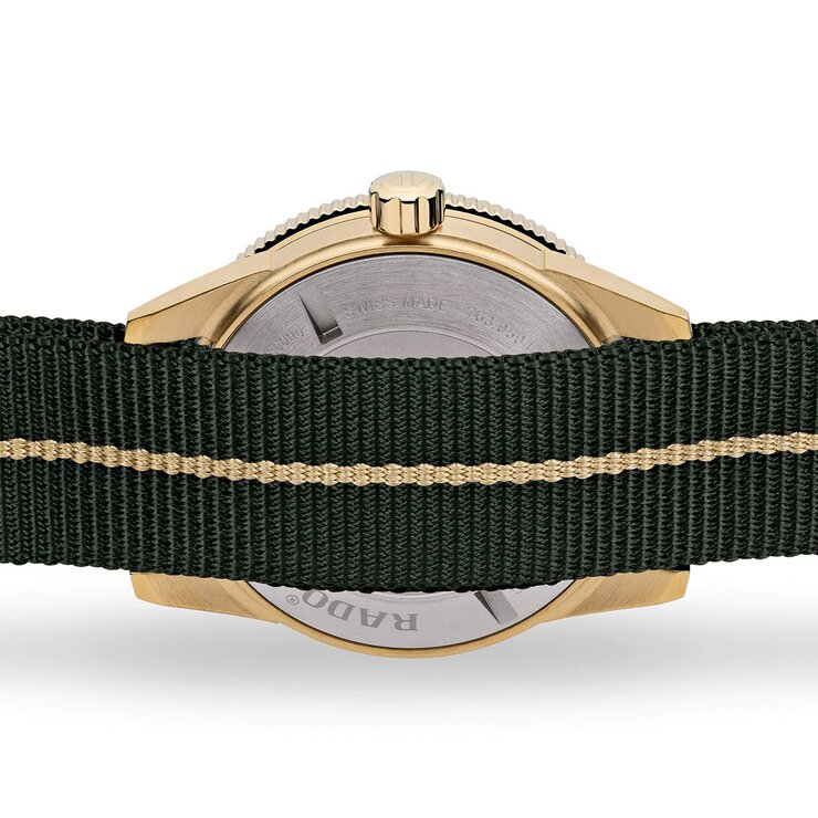 Rado horloge met een kast in brons, met een wijzerplaat in het groen en een diameter van 42