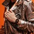 Rado horloge met een kast in keramiek en een wijzerplaat in het oranje - thumb