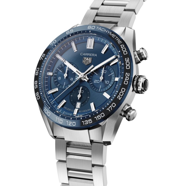montre TAG Heuer avec un boîtier en acier, un cadran bleu et un diamètre de 44