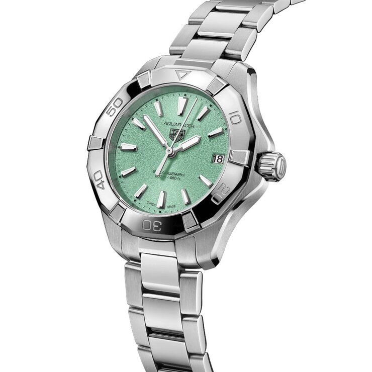TAG Heuer horloge met een kast in staal, met een wijzerplaat in het blauw en een diameter van 34