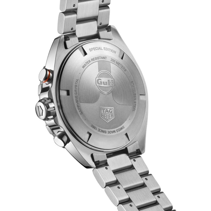 montre TAG Heuer avec un boîtier en acier, un cadran bleu et un diamètre de 43