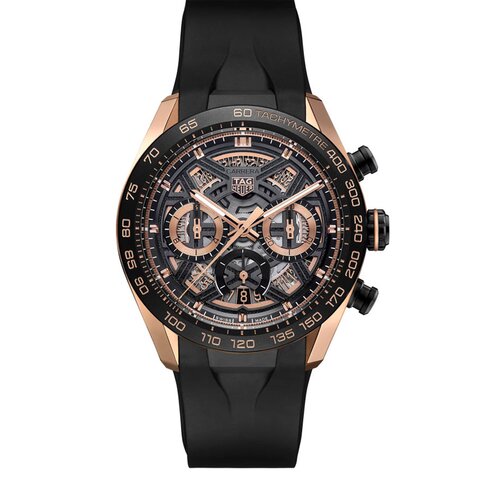 montre TAG Heuer avec un boîtier en or rose, un cadran noir et un diamètre de 44 mm