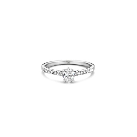 bague de fiançailles The Exclusive Collection en or blanc 18 ct avec diamant ovale de 0.41 carat comme pierre principale entouré de briljants de 0,14 karaat