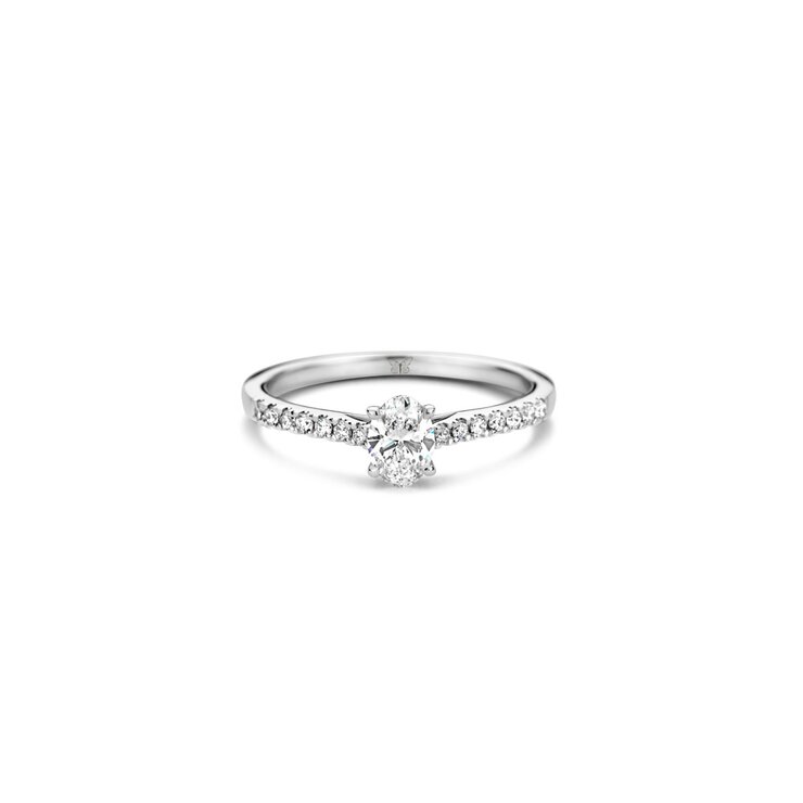 The Exclusive Collection verlovingsring in wit goud 18kt met ovalen diamant van 0,40 karaat als hoofdsteen omringd door briljanten van 0,15 karaat