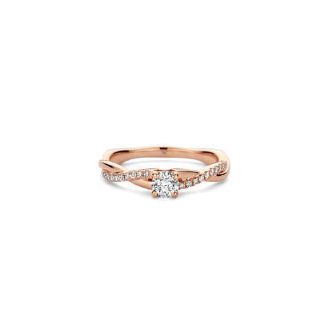 The Exclusive Collection verlovingsring in rosé goud 18kt met briljant (ronde diamant) van 0,25 karaat als hoofdsteen omringd door briljanten van 0,10 karaat