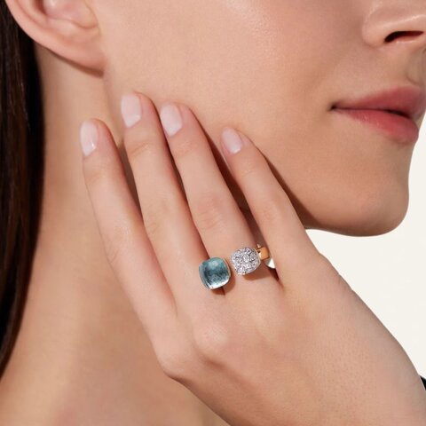 bague Pomellato en or rose 18 ct avec topaze bleue entouré de briljants de 0,80 karaat