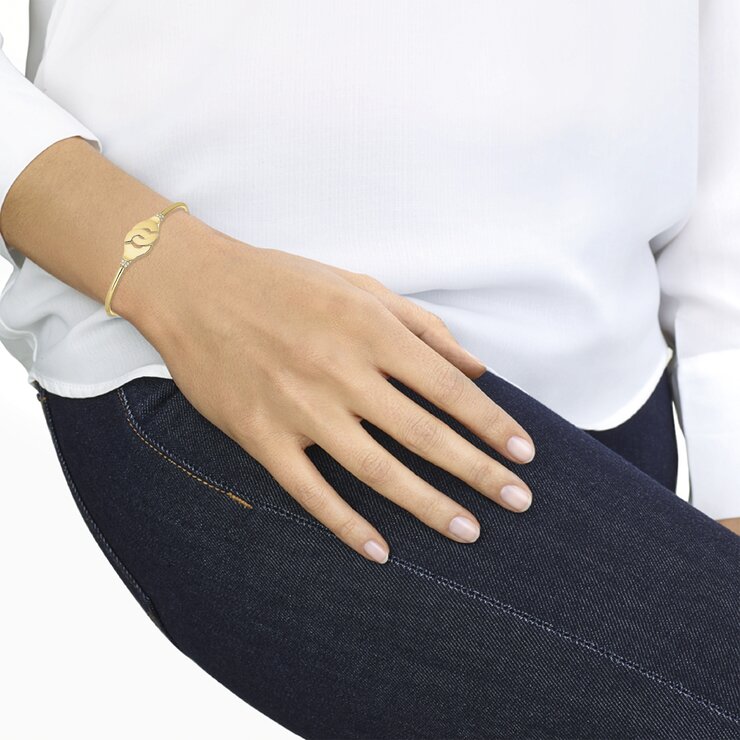 bracelet dinh van en or jaune 18 ct avec brillant de 0.19 carat