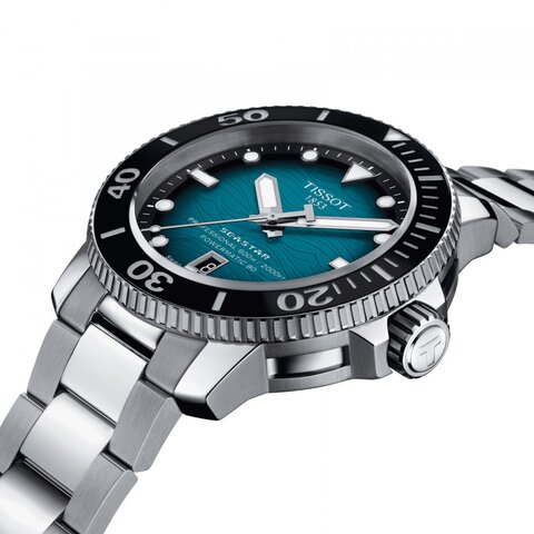 Tissot horloge met een kast in keramiek op staal, met een wijzerplaat in het blauw en een diameter van 46 mm