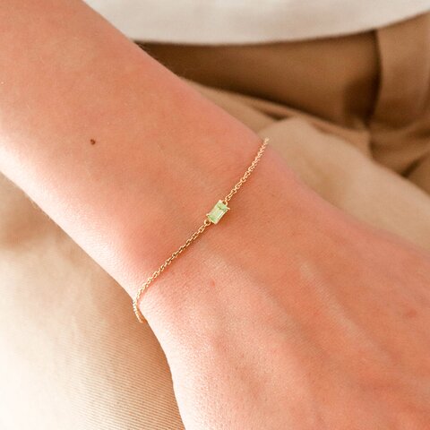 bracelet Casteur by Casteur en or jaune 18 ct avec péridot
