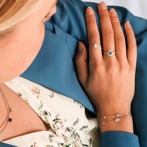 bracelet Casteur by Casteur en or blanc 18 ct avec topaze bleue entouré de briljants de 0,04 karaat