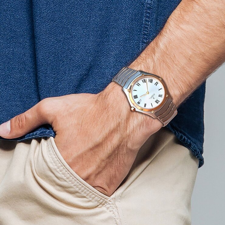 Ebel horloge met een kast in geel goud op staal, met een wijzerplaat in het wit en een diameter van 37