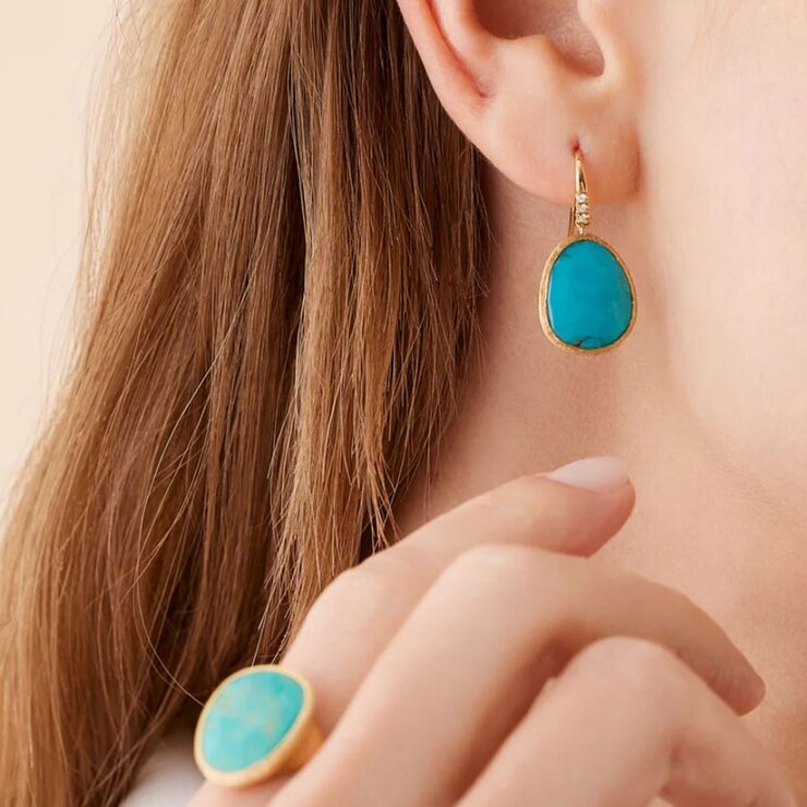 Marco Bicego oorringen in geel goud 18kt met turquoise omringd door briljanten van 0,04 karaat