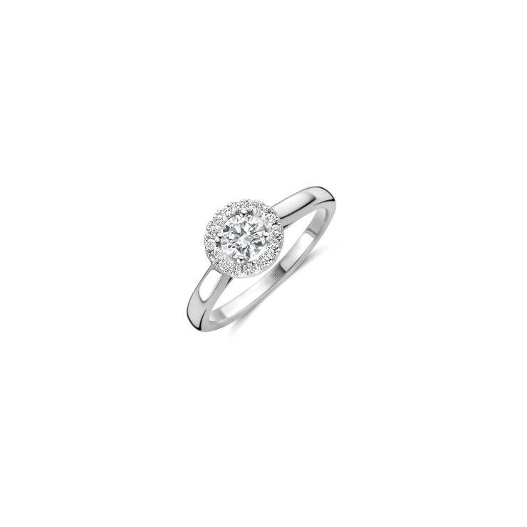 The Exclusive Collection verlovingsring in wit goud 18kt met briljant (ronde diamant) van 0,41 karaat als hoofdsteen omringd door briljanten van 0,15 karaat