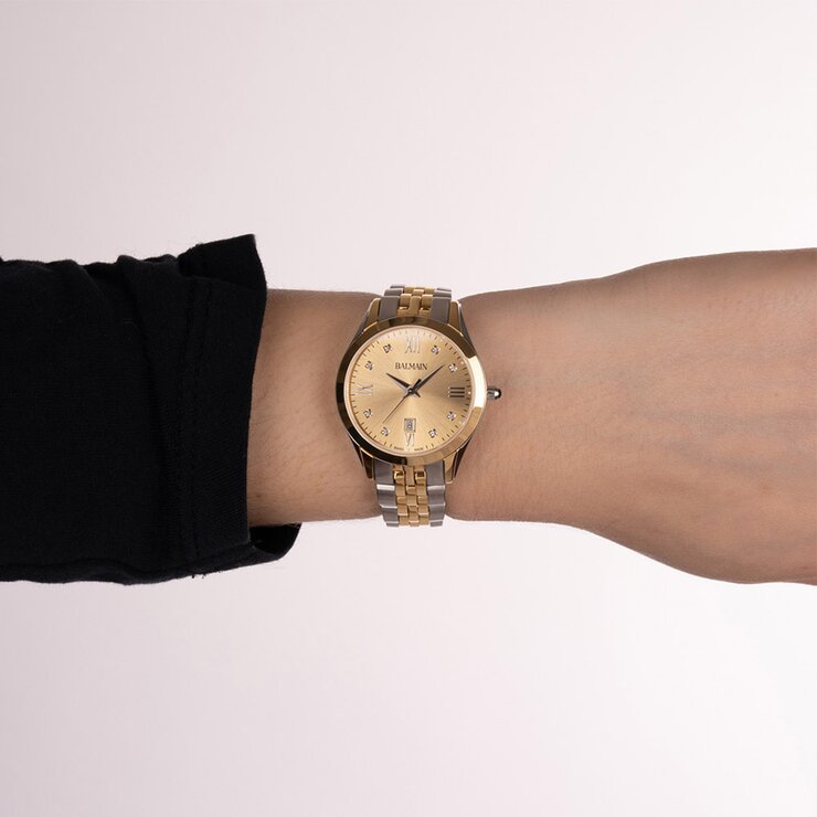 Balmain horloge met een kast in gele pvd-coating op staal, met een wijzerplaat in het geel met briljant en een diameter van 30 mm