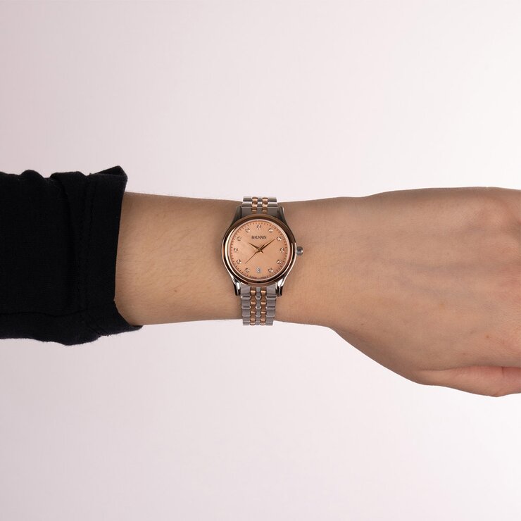 Balmain horloge met een kast in rosé pvd-coating op staal, met een wijzerplaat in het parelmoer met  briljant en een diameter van 27,5