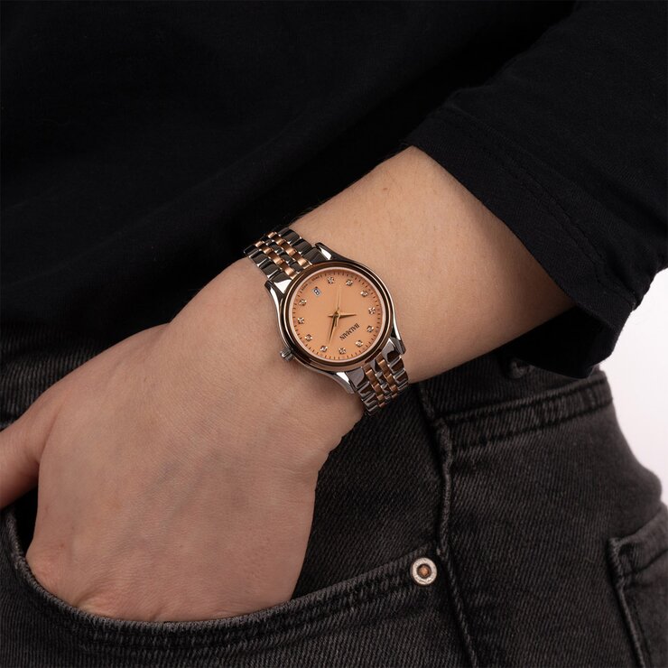 Balmain horloge met een kast in rosé pvd-coating op staal, met een wijzerplaat in het parelmoer met  briljant en een diameter van 27,5