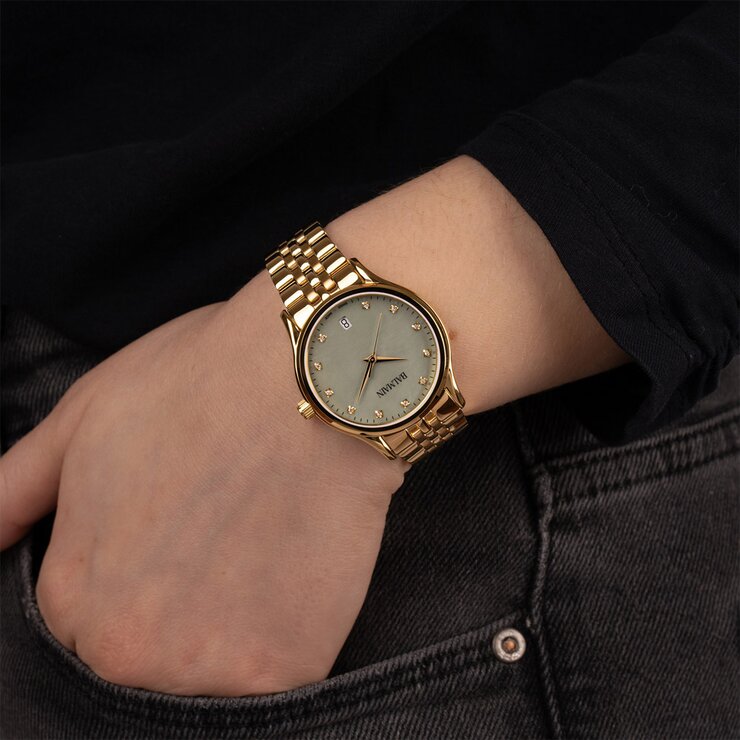 Balmain horloge met een kast in gele pvd-coating, met een wijzerplaat in het parelmoer met  briljant en een diameter van 32 mm