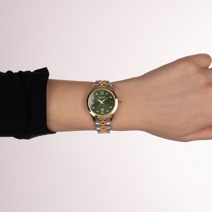Balmain horloge met een kast in gele pvd-coating op staal, met een wijzerplaat in het groen met briljant en een diameter van 30