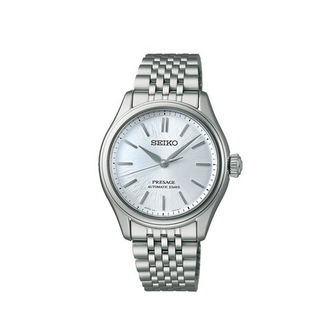 montre Seiko avec un boîtier en acier, un cadran argent et un diamètre de 36