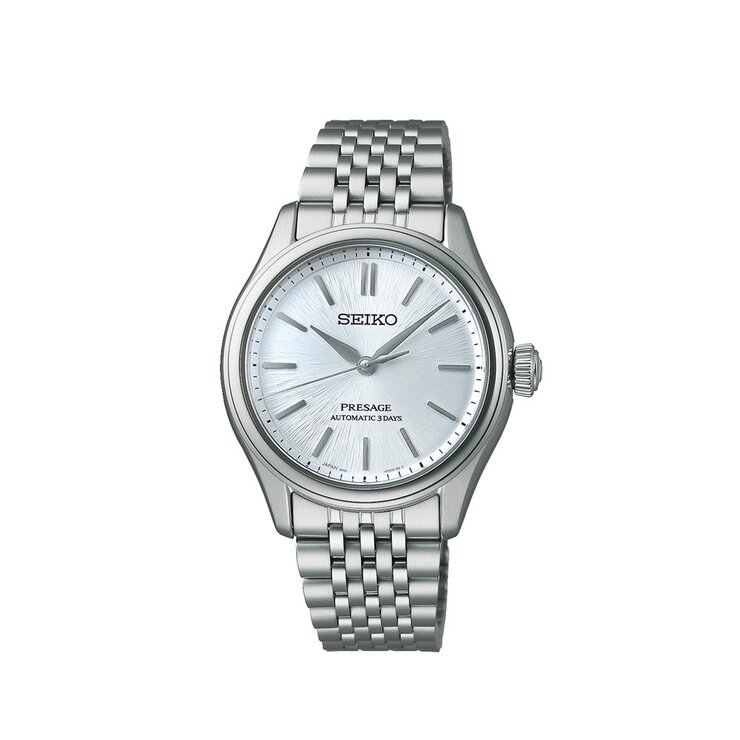 montre Seiko avec un boîtier en acier, un cadran argent et un diamètre de 36