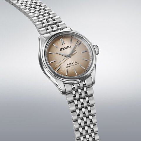 Seiko horloge met een kast in staal, met een wijzerplaat in het bruin en een diameter van 36 mm