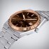 montre Tissot avec un boîtier en or rose sur acier, un cadran brun et un diamètre de 40 mm - thumb